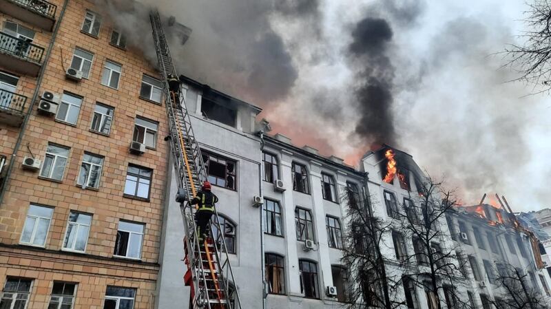 Firefighters extinguishing a fire in the Kharkiv regional police department building, in Kharkiv on March 2nd, 2022. Photograph: Ukraine Emergency Ministry press service/AFP via Getty Images