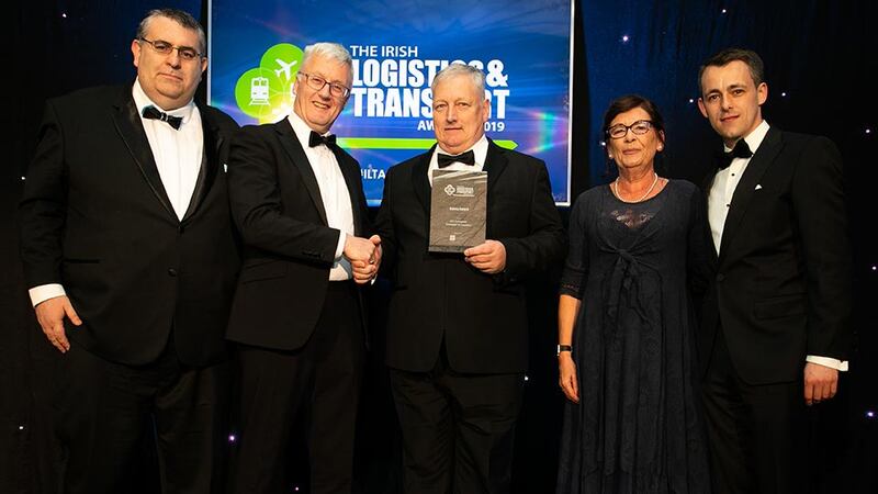 Liam Duggan, Director, RSA presents the Safety Award to the ATC Computer Transport & Logistics team.