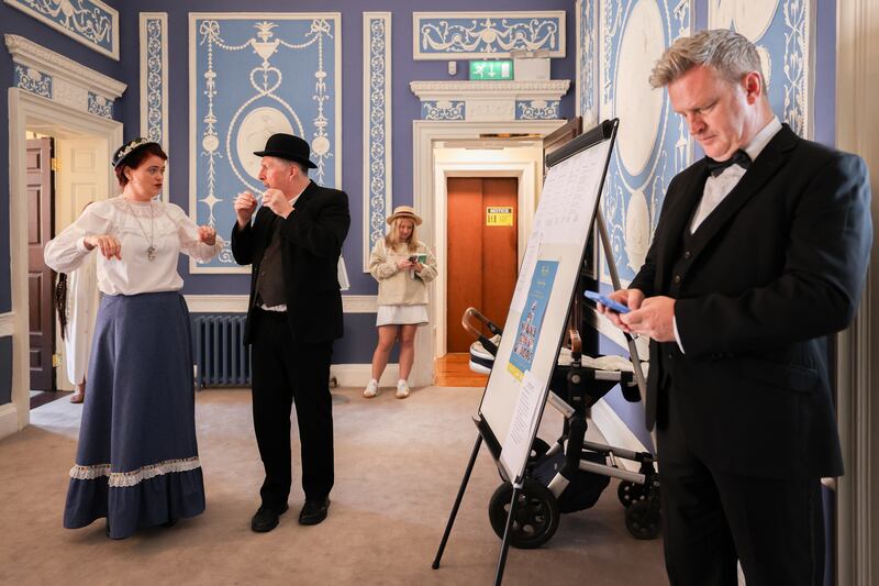 Singer Simon Morgan (right) and other performers prepare behind the scenes at the Bloomsday breakfast in Belvedere College, Dublin. Photograph: Dan Dennison