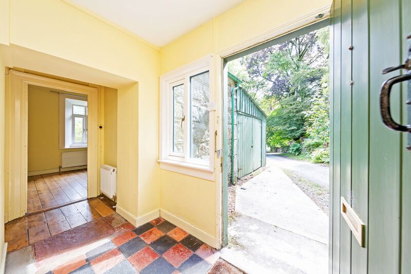 Cloneen Cottage has timber and quarry-tile flooring throughout