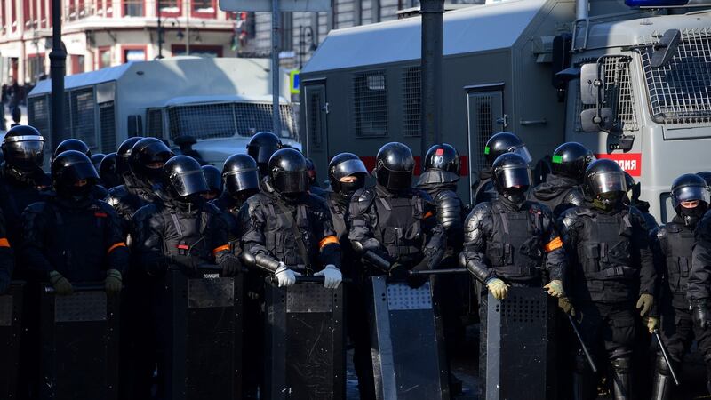 Riot police officers stand guard during a rally in support of jailed opposition leader Alexei Navalny in the far eastern city of Vladivostok on Sunday. Photograph: Pavel Korolyov/AFP via Getty Images