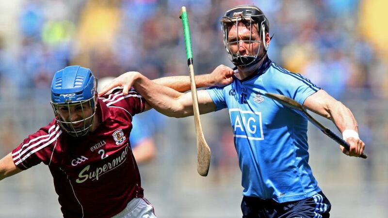 Johnny Coen of Galway battles  with Mark Schutte of Dublin during the Leinster SHC quarter-final at Croke Park. Photo: Donall Farmer/Inpho
