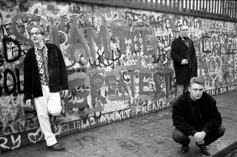 A House: the band with I Am the Greatest graffiti ouside U2’s studio in 1991. Photograph: Martyn Goodacre/Getty