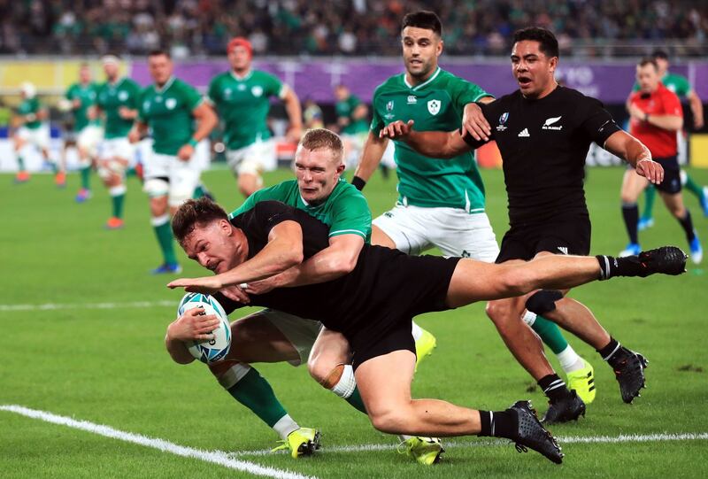New Zealand's George Bridge is tackled by Keith Earls. Photo: Adam Davy/PA Wire