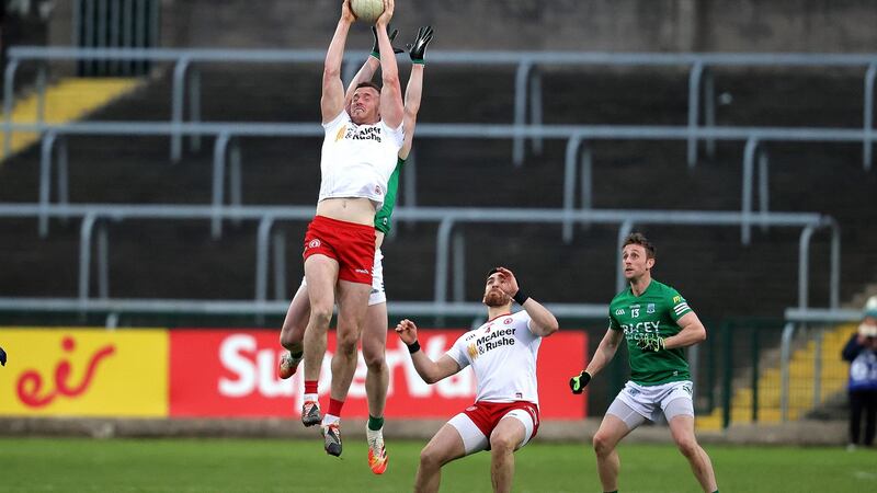 Tyrone’s Brian Kennedy gains possession ahead of Darragh McGurn of Fermanagh during the  Ulster SFC preliminary round game at Brewster Park in Enniskillen. Photograph: Bryan Keane/Inpho