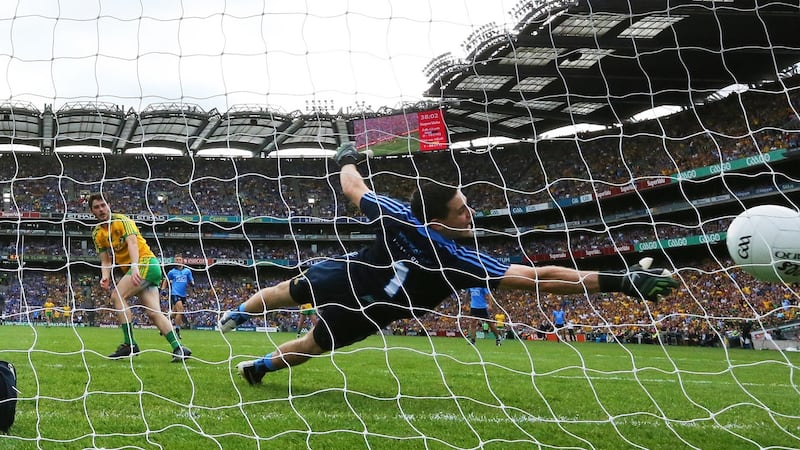 Donegal’s Ryan McHugh scores a goal past Dublin goalkeeper Stephen Cluxton. Photograph: Cathal Noonan/Inpho